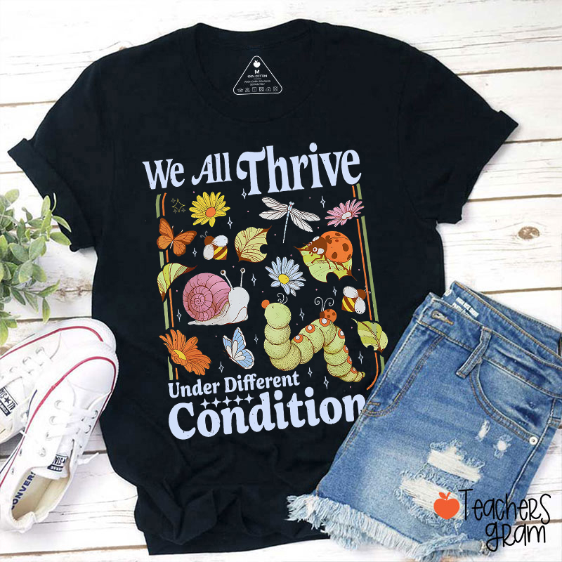 We All Thrive Under Different Conditions Teacher T-Shirt