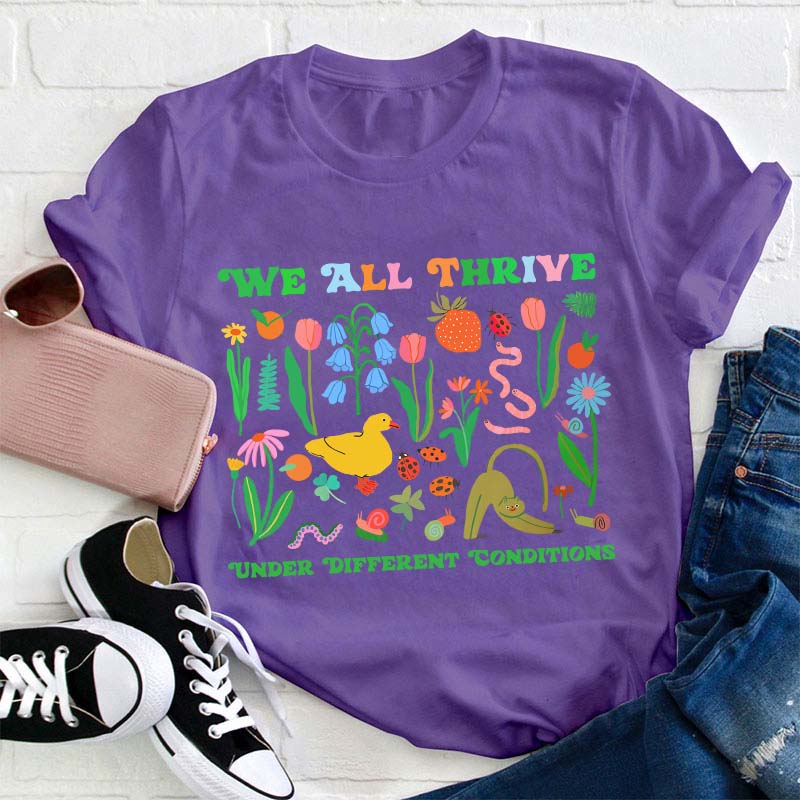 We All Thrive Under Different Conditions Teacher T-Shirt