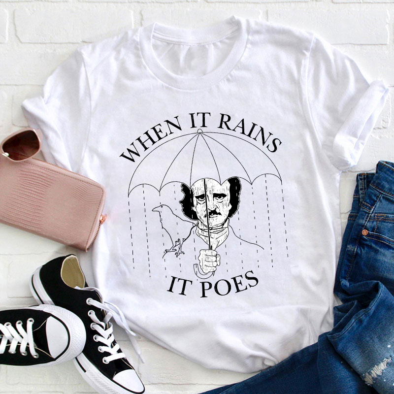 When It Rains It Poes Teacher T-Shirt