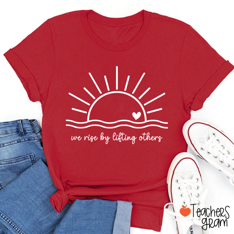 We Rise By Lifting Others Teacher T-Shirt