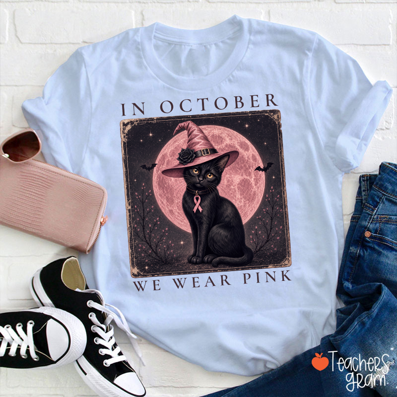 In October We Wear Pink Witch Black Cat Pink Moon Breast Cancer Awareness Teacher T‑Shirt