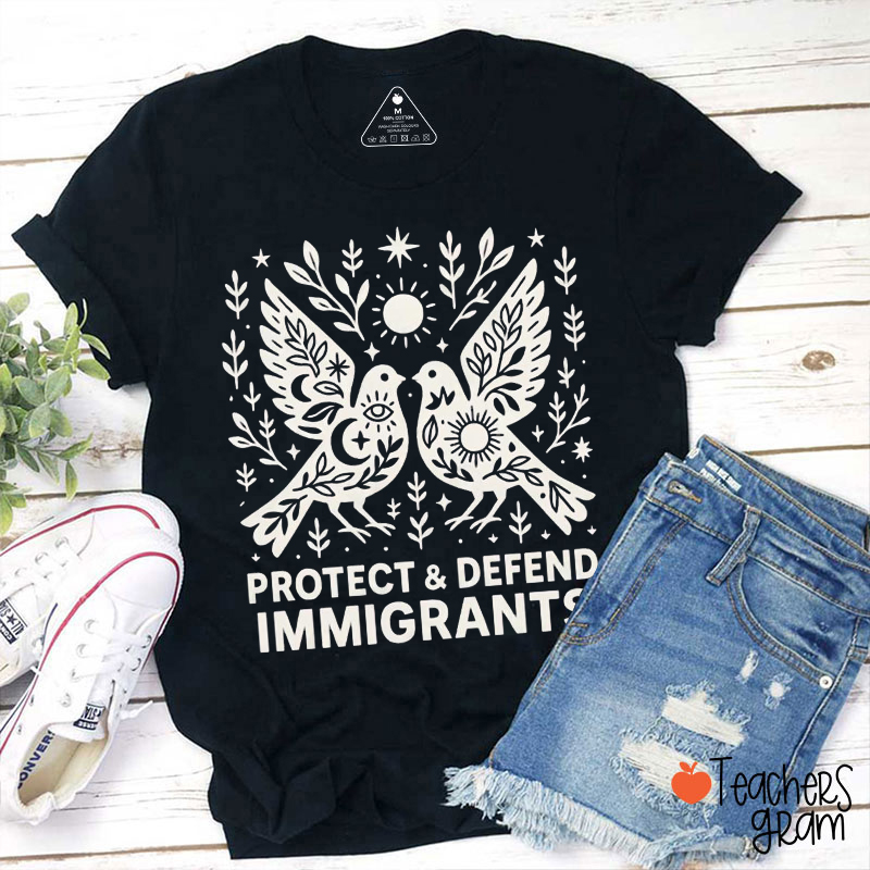 Protect And Defend Immigrants Teacher T-Shirt