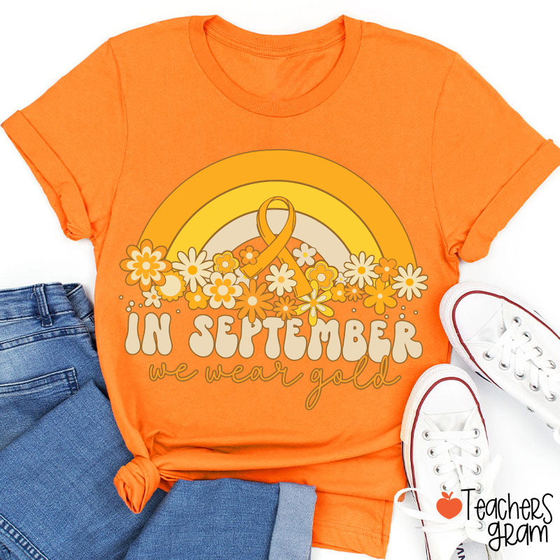 Gold Rainbow In September We Wear Gold Teacher T-Shirt