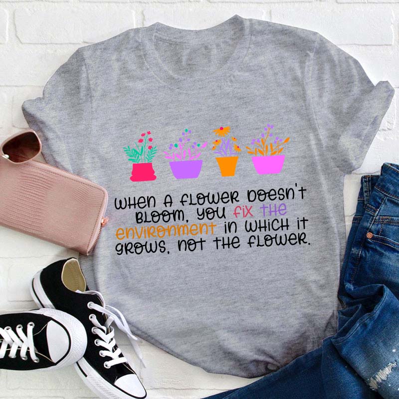 When A Flower Doesn't Bloom Teacher T-Shirt