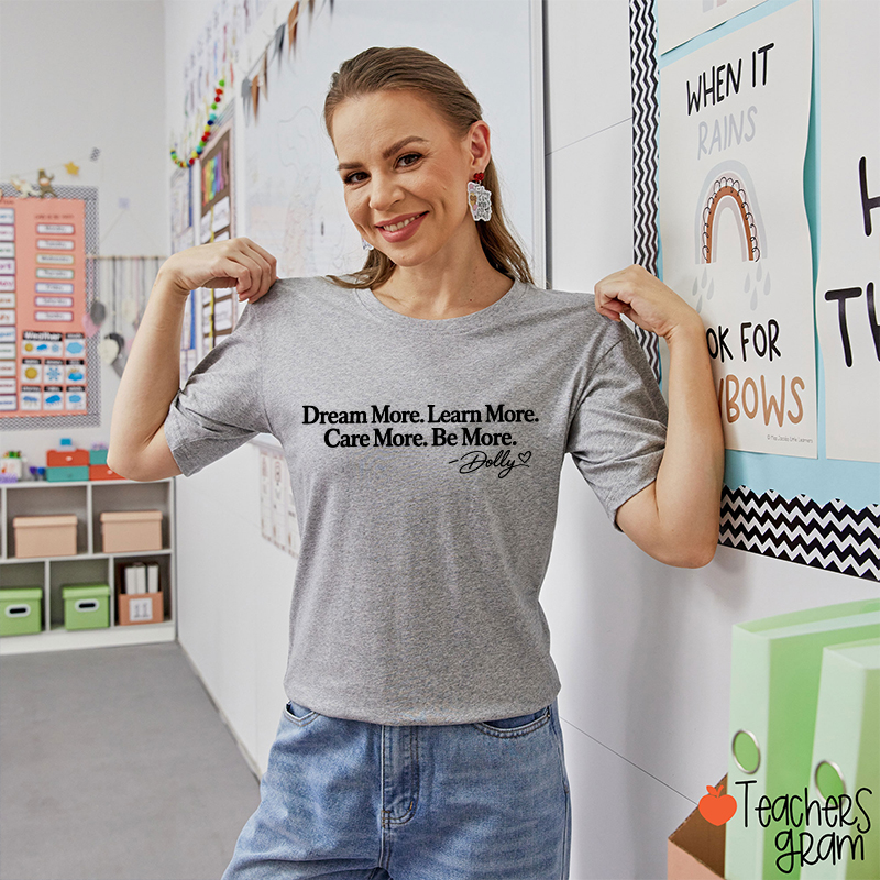 Dream More Learn More Care More Be More Dolly Quote Teacher T‑Shirt