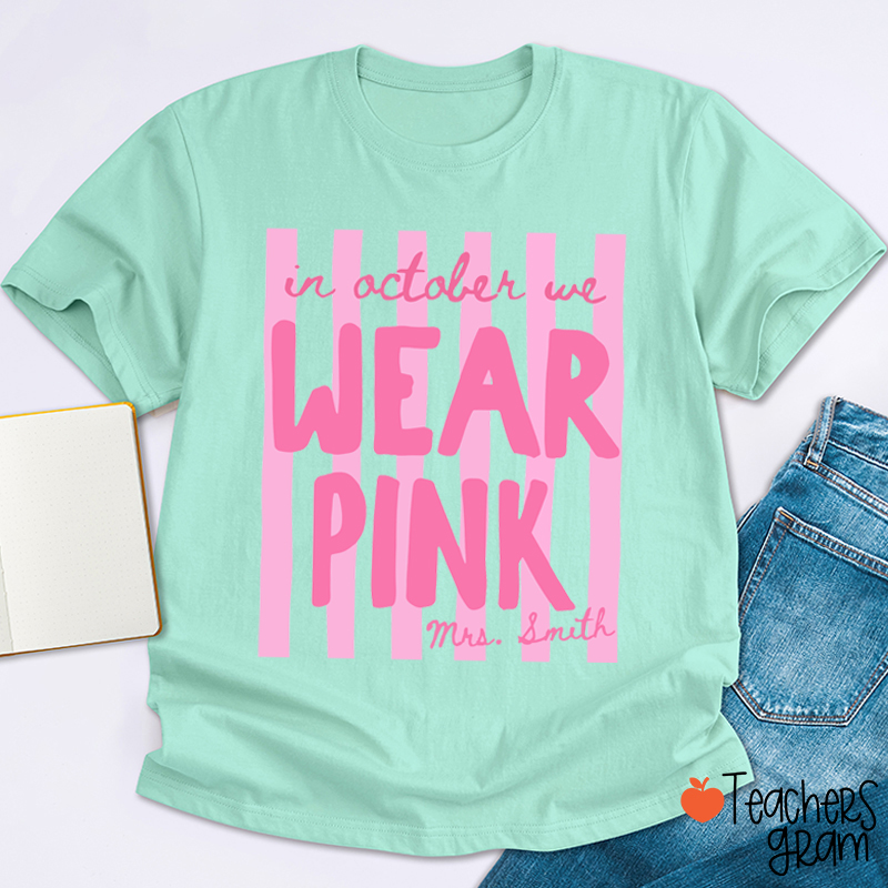 Personalized Name In October We Wear Pink Striped Teacher T-Shirt