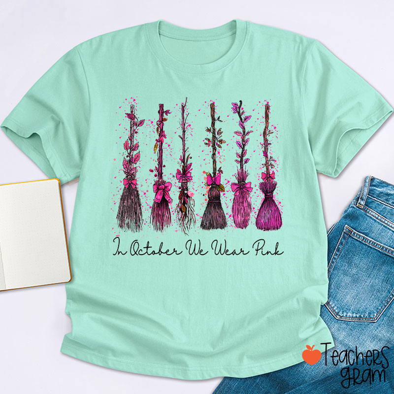 On Wednesday We Wear Pink Witch Broom Teacher T-Shirt