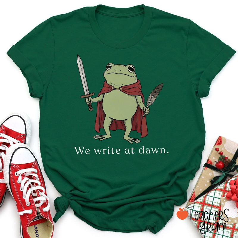 Knight Frog With Sword Quill We Write At Dawn Teacher T-Shirt