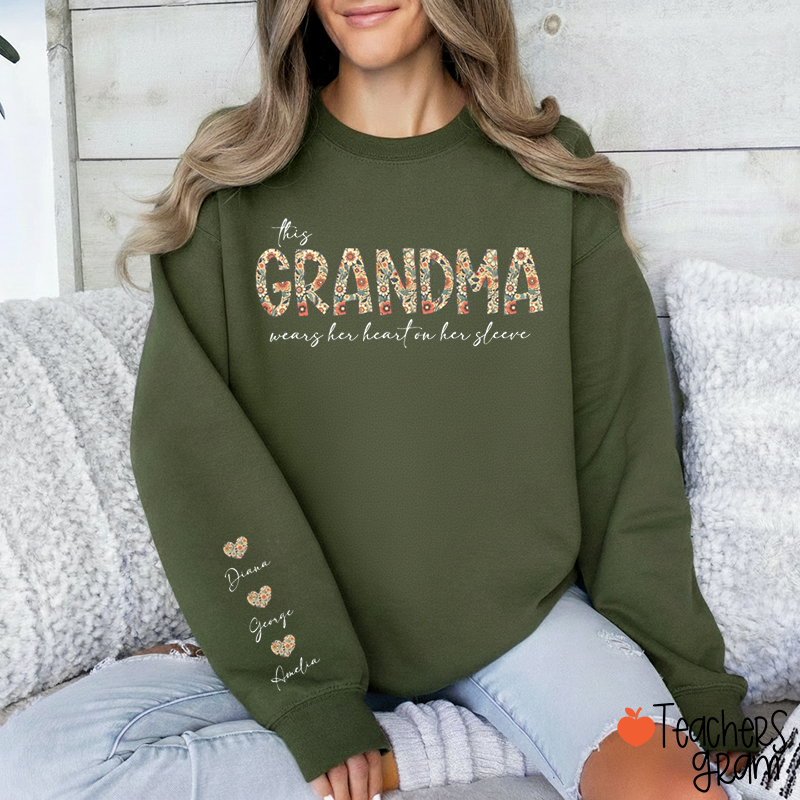 Personalized This Grandma Wears Her Heart On Her Sleeve Teacher Sleeve Print Sweatshirt