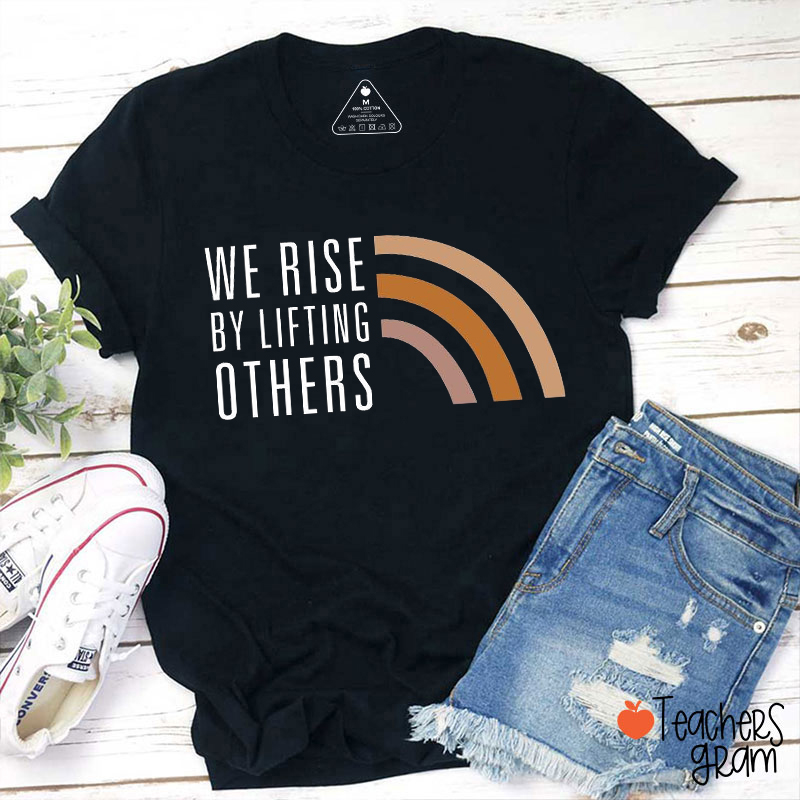 We Rise By Lifting Others Teacher T-Shirt