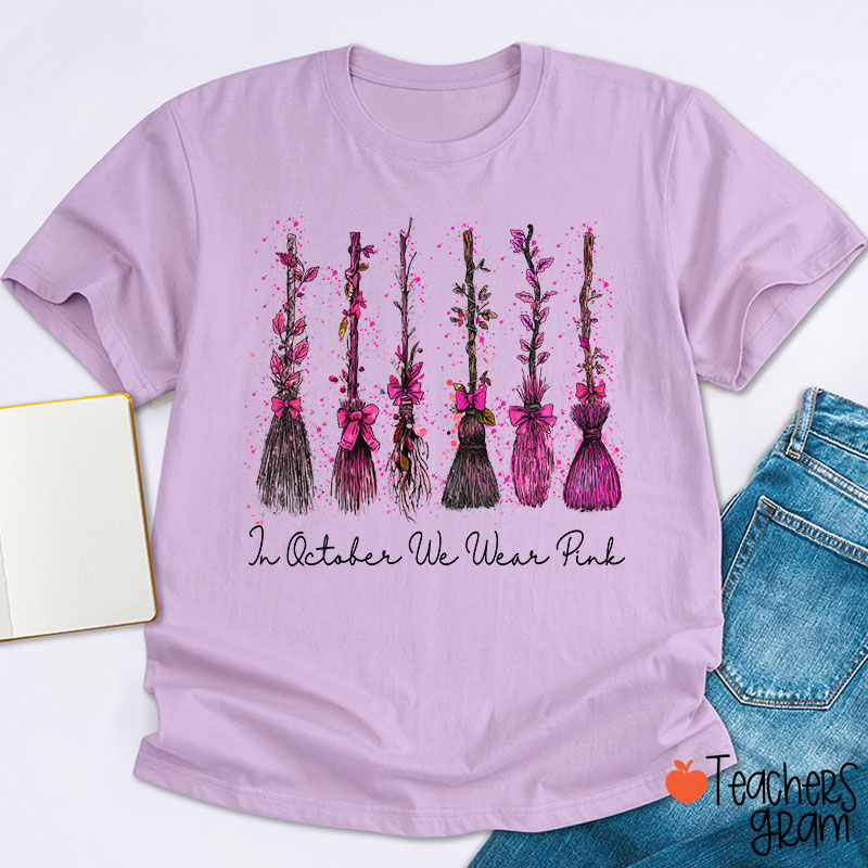 On Wednesday We Wear Pink Witch Broom Teacher T-Shirt
