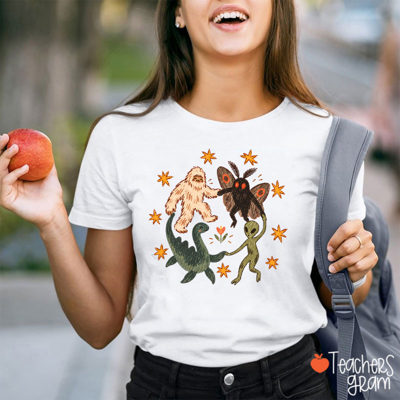 Starry Masquerade Of Mysterious Creatures Teacher T-Shirt