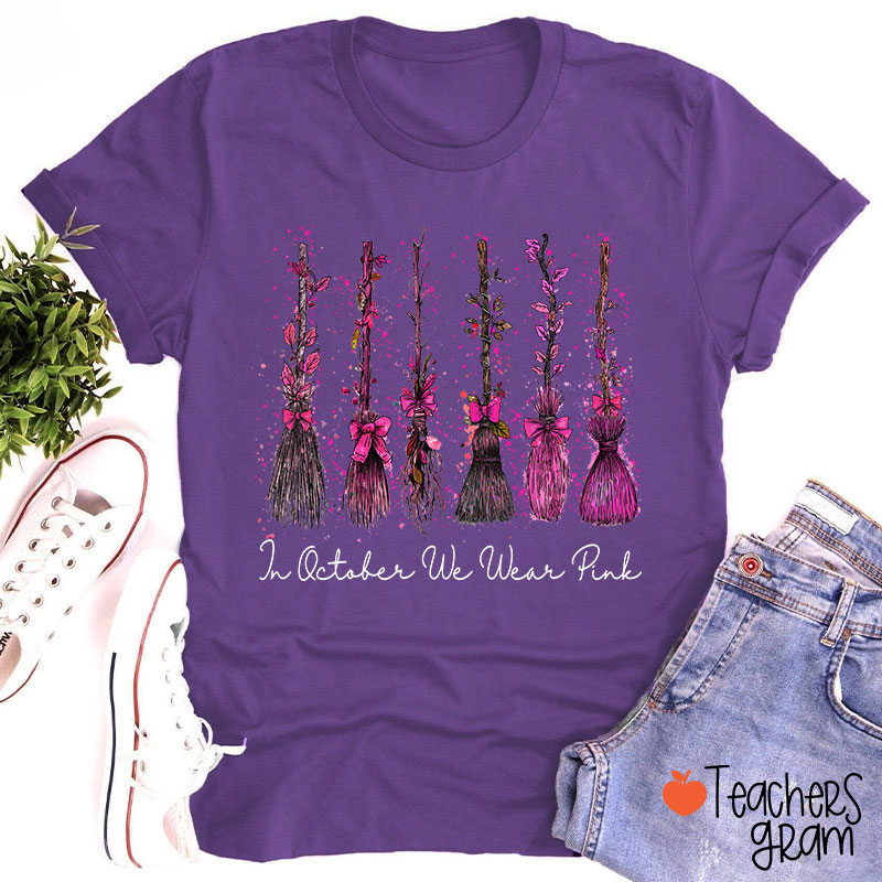 On Wednesday We Wear Pink Witch Broom Teacher T-Shirt