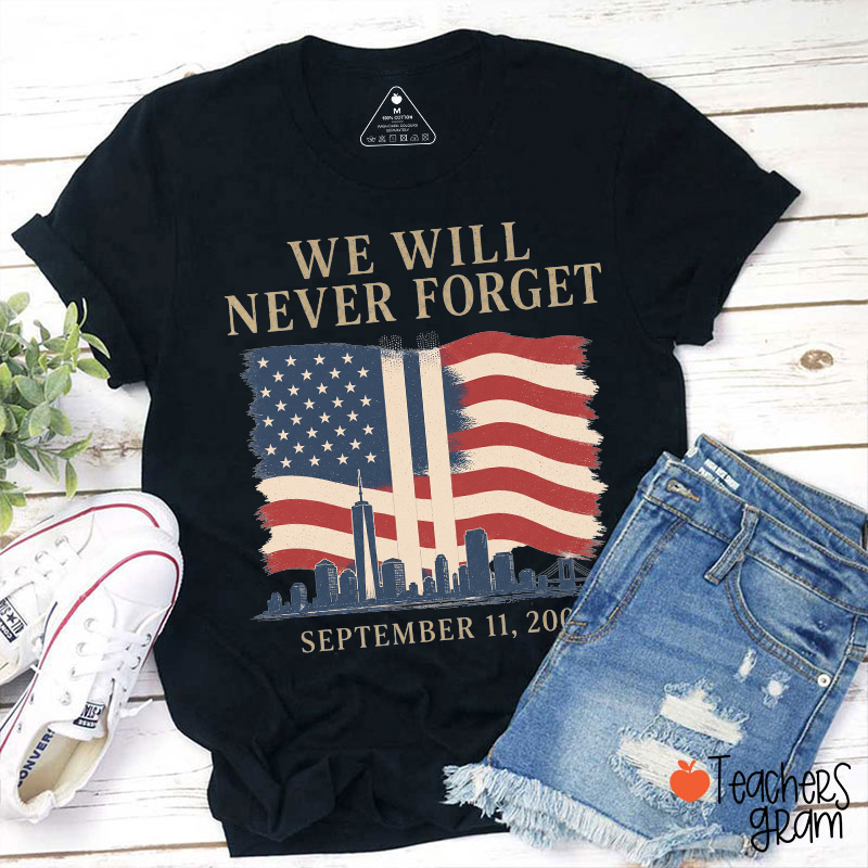 We Will Never Forget September 11 American Flag City Skyline Teacher T‑Shirt