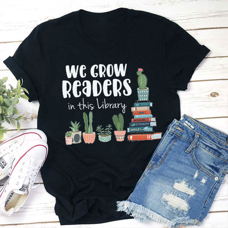 We Grow Readers In This Library Teacher T-Shirt