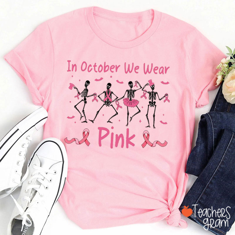 Awareness Skeletons In October We Wear Pink  Teacher T-Shirt