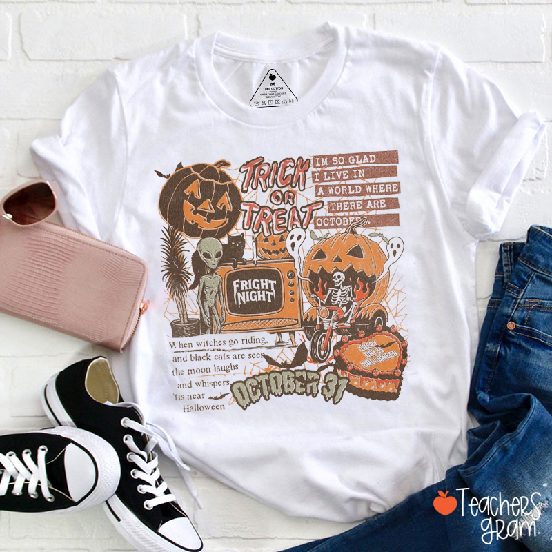Trick Or Treat Im So Glad I Live In A World Where Teacher T-Shirt