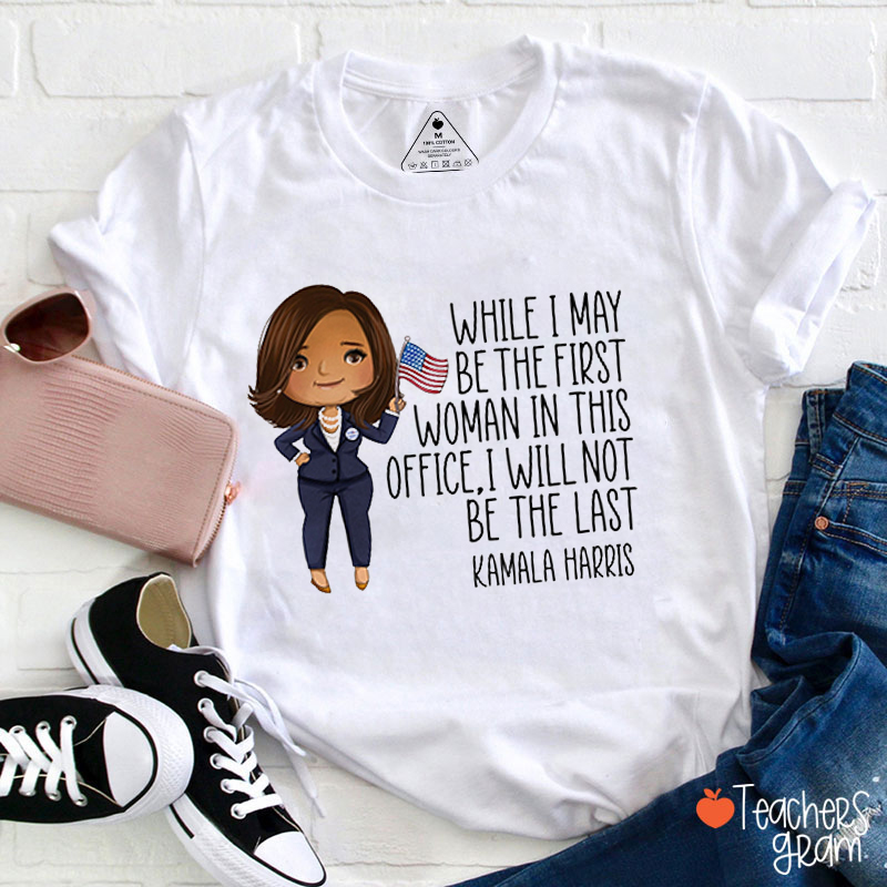 While I May Be The First Woman In This Office Teacher T-Shirt