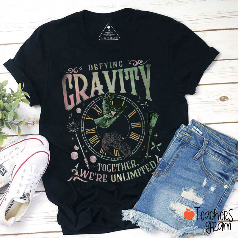 Defying Gravity Together We're Unlimited Teacher T-Shirt