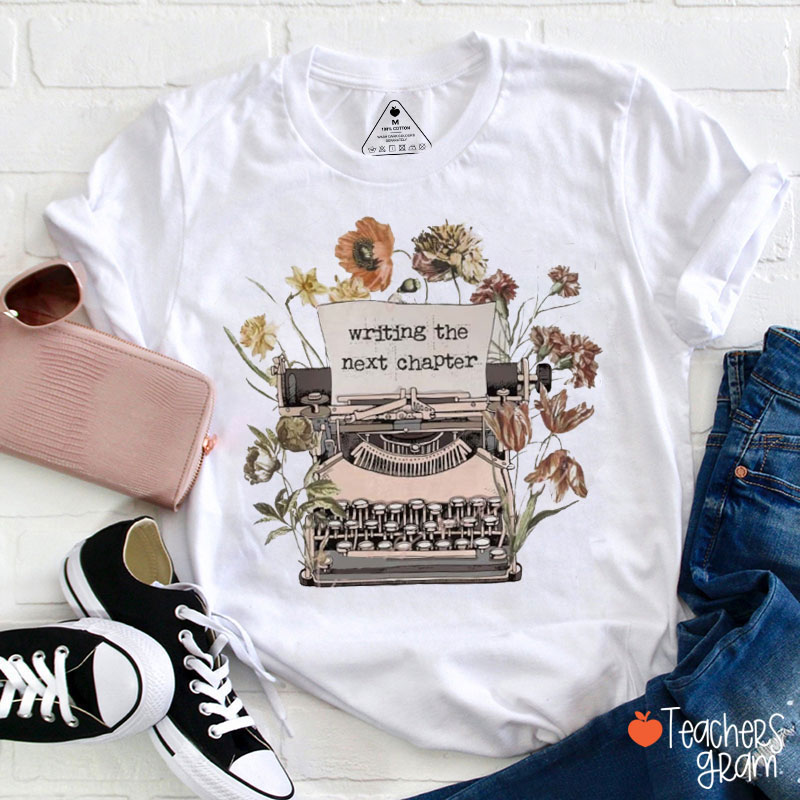 Writing The Next Chapter Teacher T-Shirt