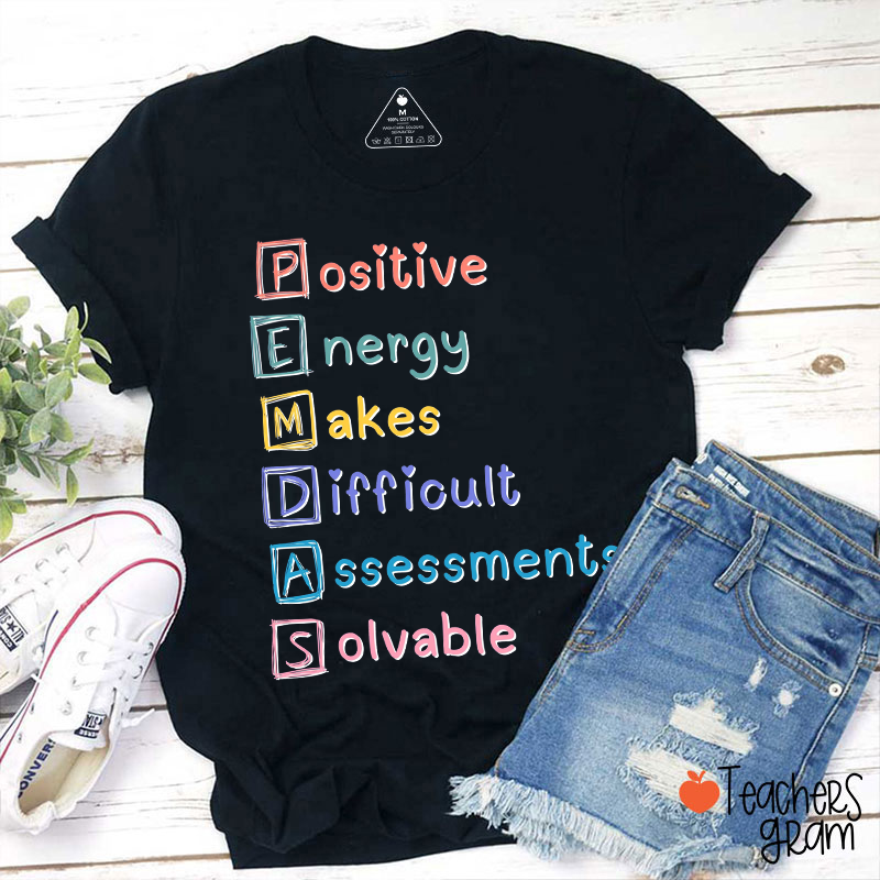 Positive Energy Makes Difficult Assessments Solvable Teacher T-Shirt