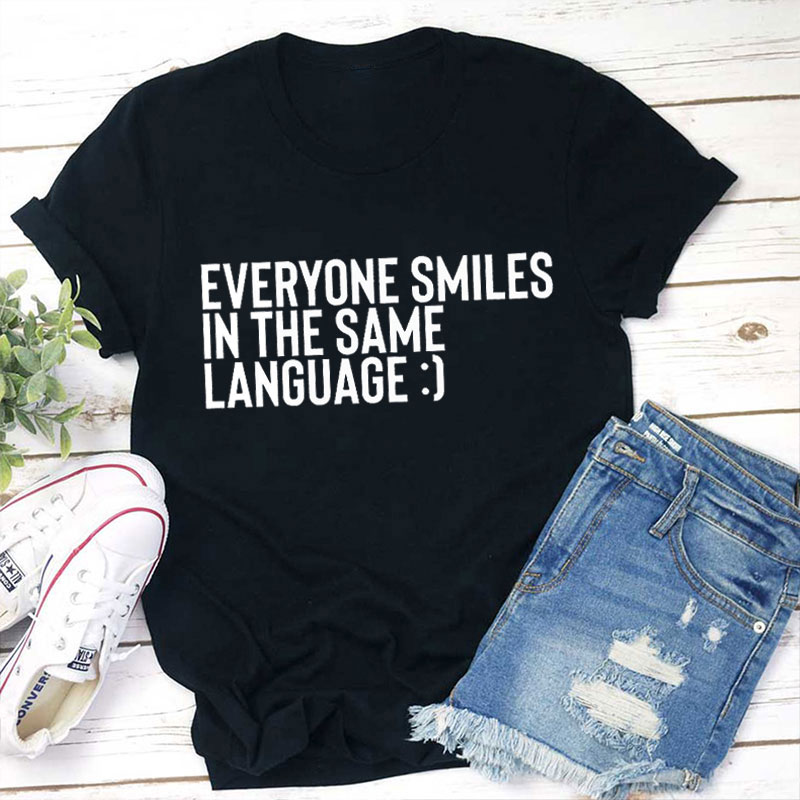 Smile Everyone Smiles In The Same Language Teacher T-Shirt
