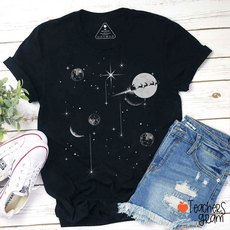 Santa Claus Sleigh In The Moon Sky Teacher T-Shirt