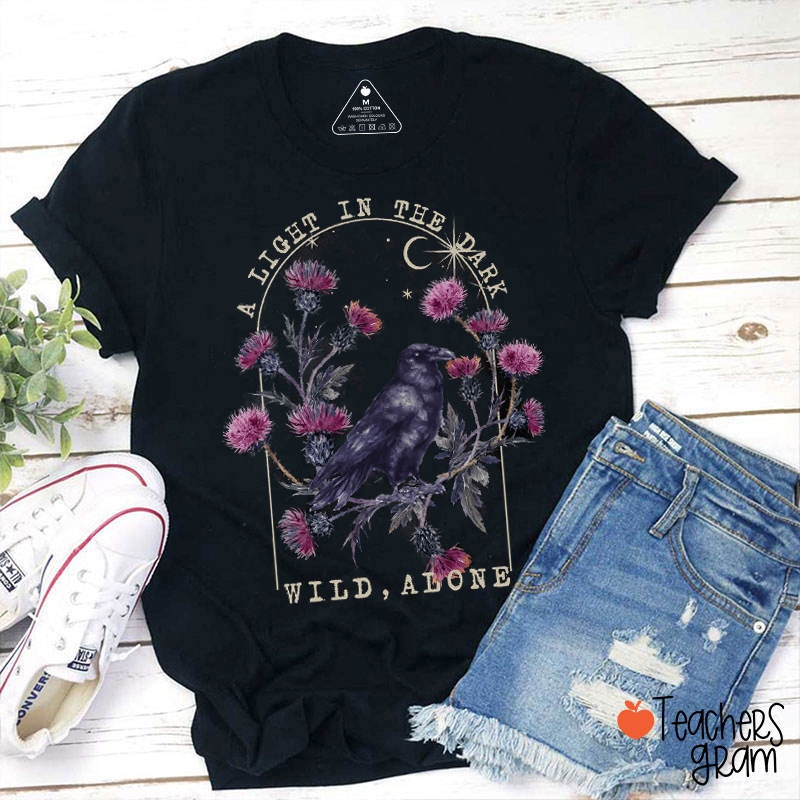 A Light In The Dark Wild Alone Teacher T-Shirt