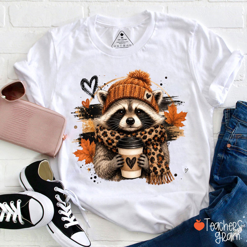 Cute Raccoon With Knit Hat Leopard Scarf Coffee And Fall Leaves Teacher T-Shirt