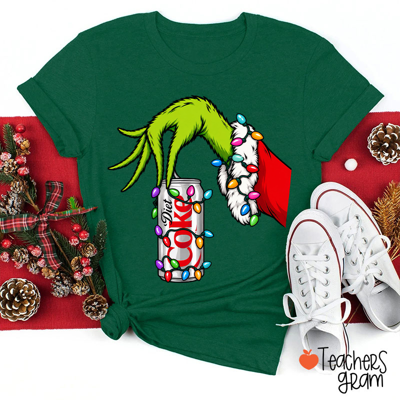 Green Monster Hand Holding Soda Can With Christmas Lights Teacher T-Shirt