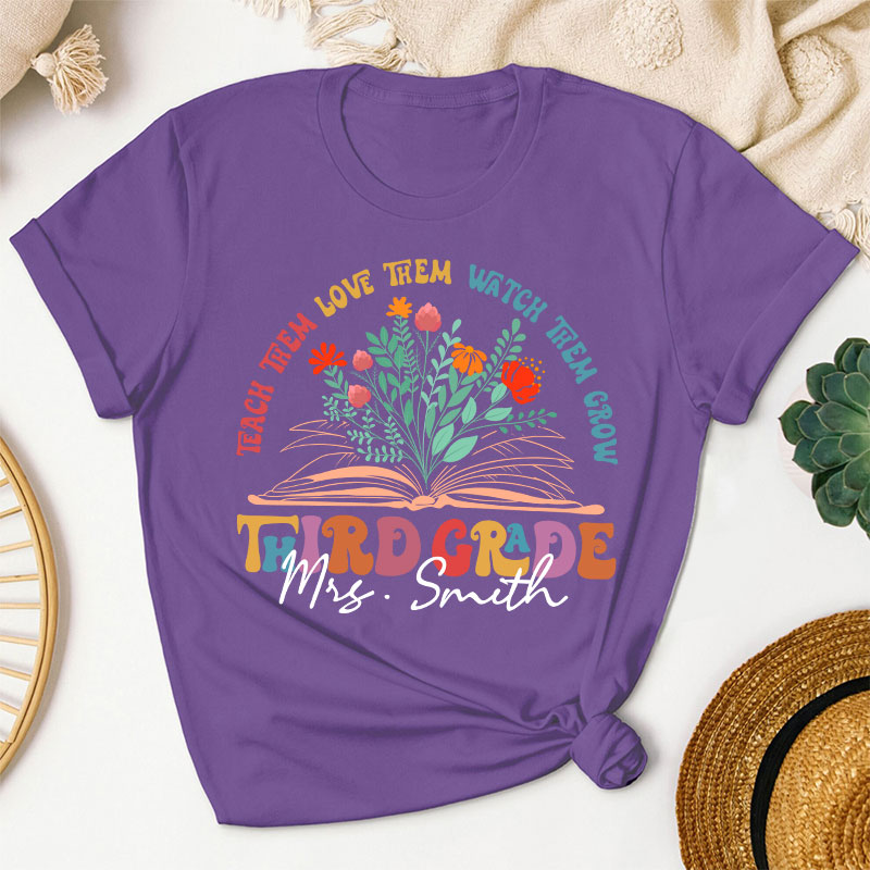 Personalized Book And Flower Teach Them Love Them Watch Them Grow Teacher T-Shirt