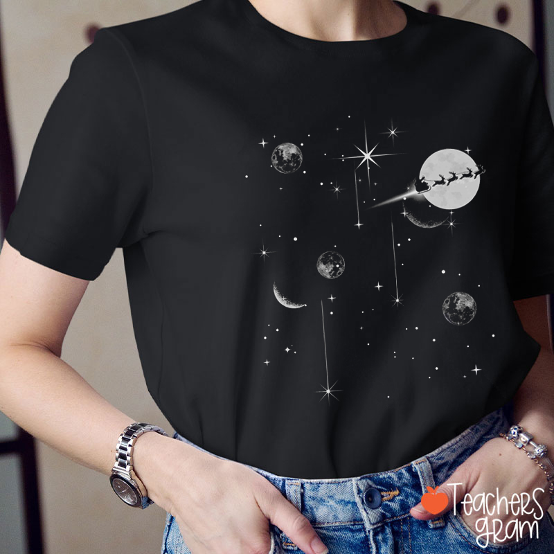 Santa Claus Sleigh In The Moon Sky Teacher T-Shirt