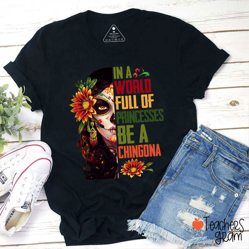 In A World Full Of Princesses Be A Chingona Teacher T-Shirt