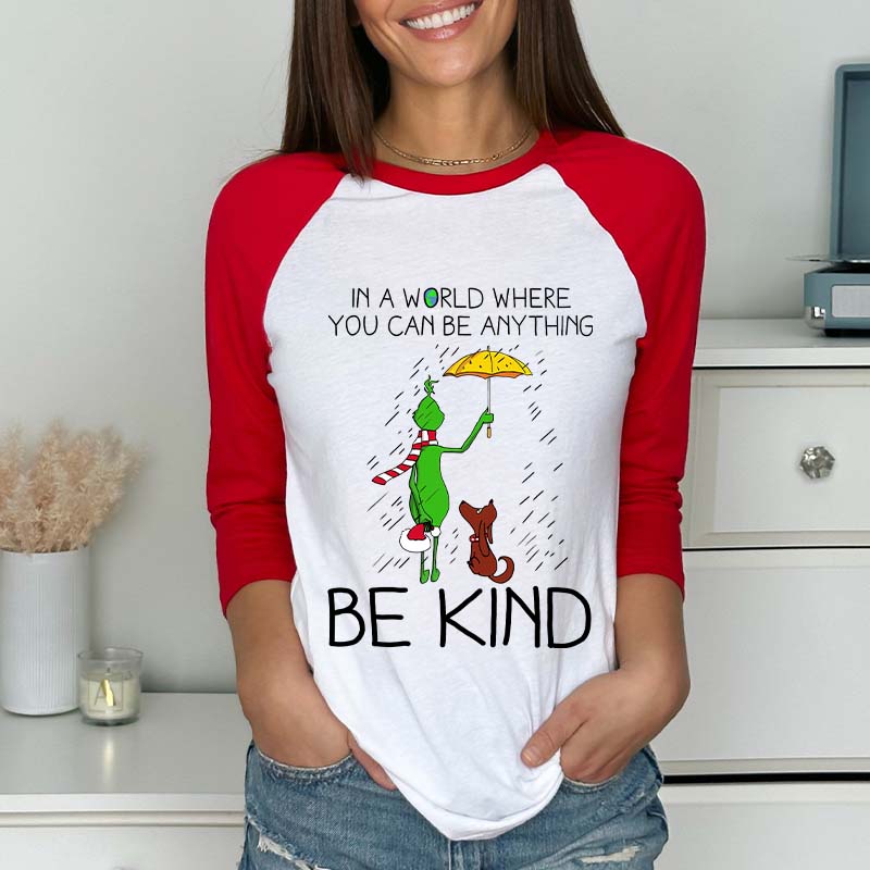 In A World Where You Can Be Anything Be Kind Teacher Raglan Long Sleeve T-Shirt