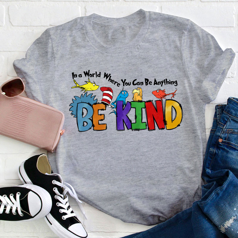 In a World Where You Can Be Anything Teacher T-Shirt