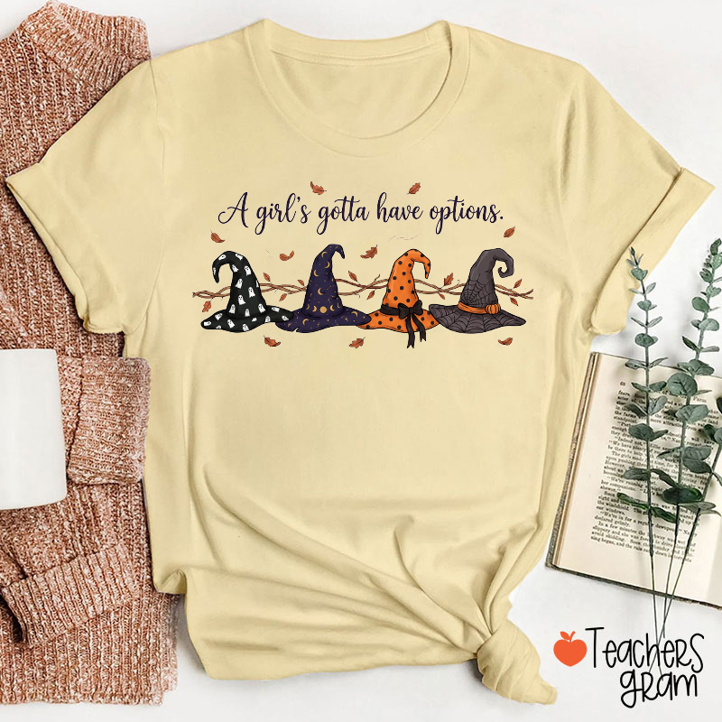 A Girl's Gotta Have Options Witch Hats Fall Leaves Halloween Teacher T‑Shirt