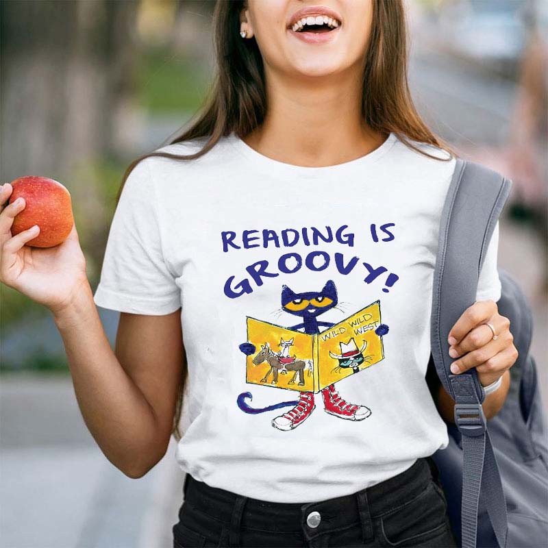 Reading Is Groovy Teacher T-Shirt