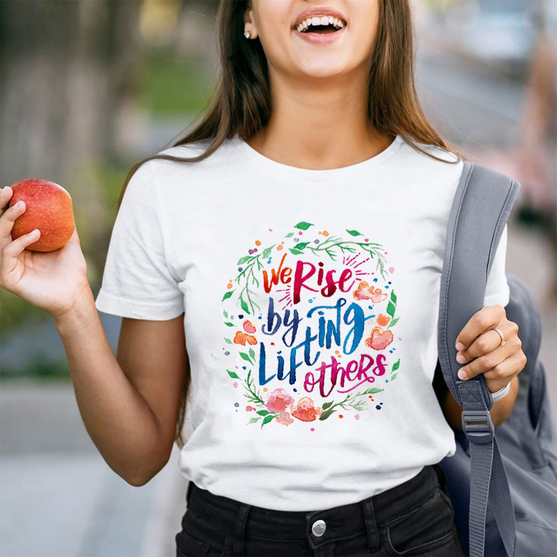 We Rise By Lifting Others Teacher T-Shirt