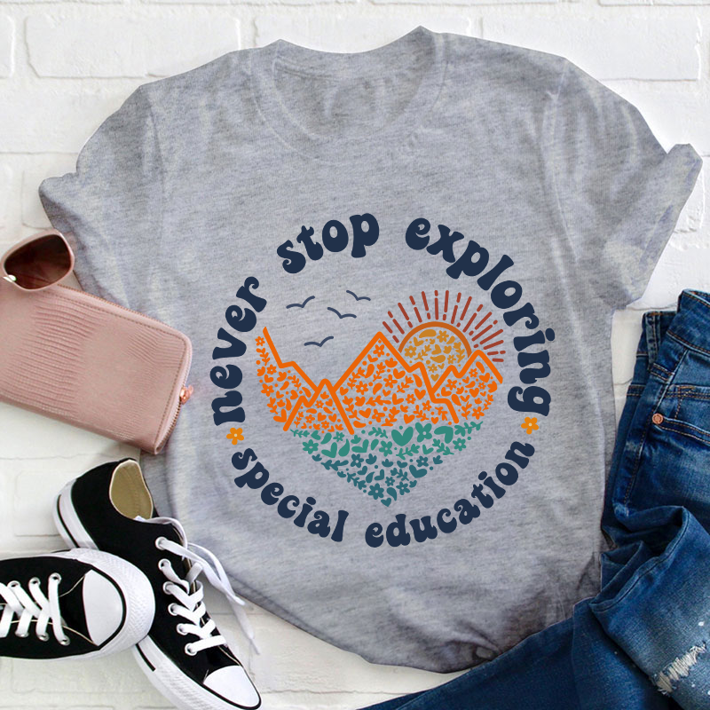 Never Stop Exploring Teacher T-Shirt