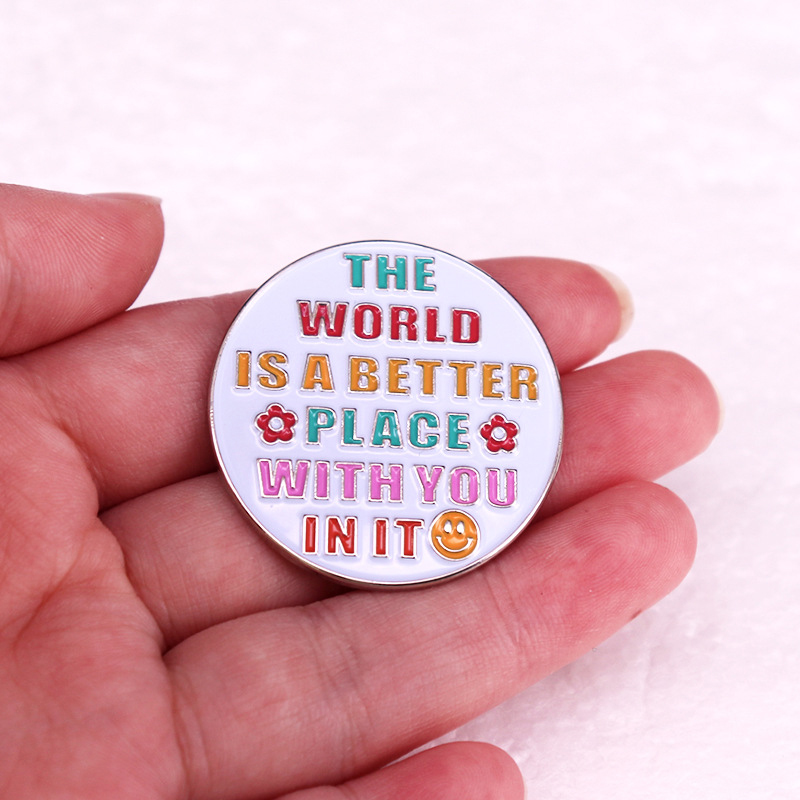 The World Is A Better Place Teacher Pin