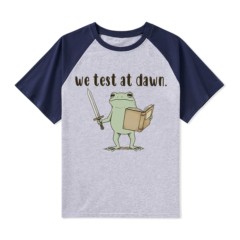 We Test At Dawn Teacher Raglan T-Shirt