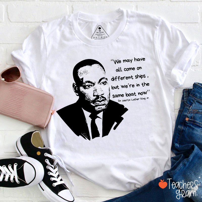 We May Have All Come On Different Ships Teacher T-Shirt