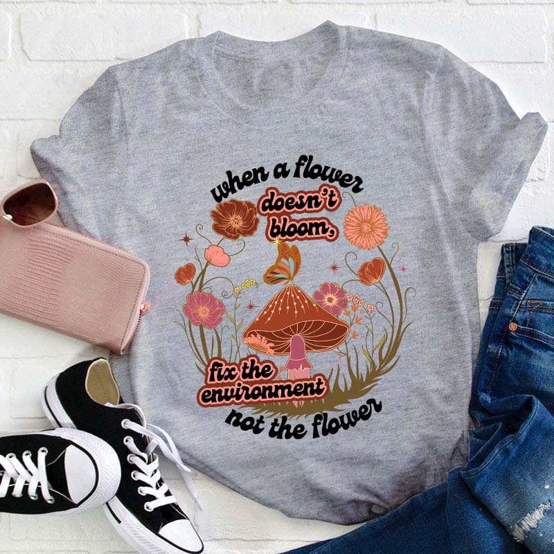 When A Flower Doesn't Bloom Teacher T-Shirt