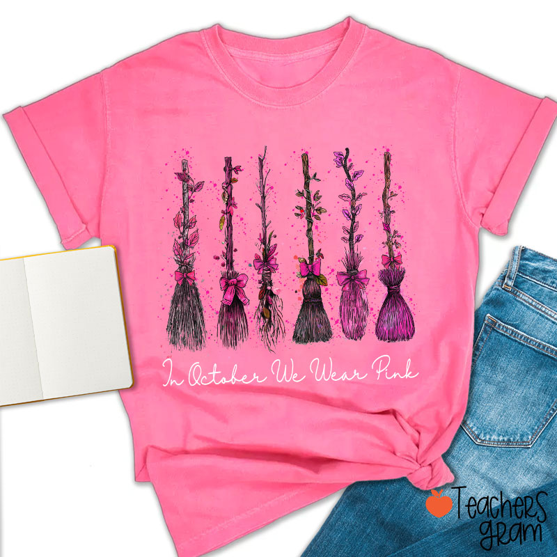 On Wednesday We Wear Pink Witch Broom Teacher T-Shirt