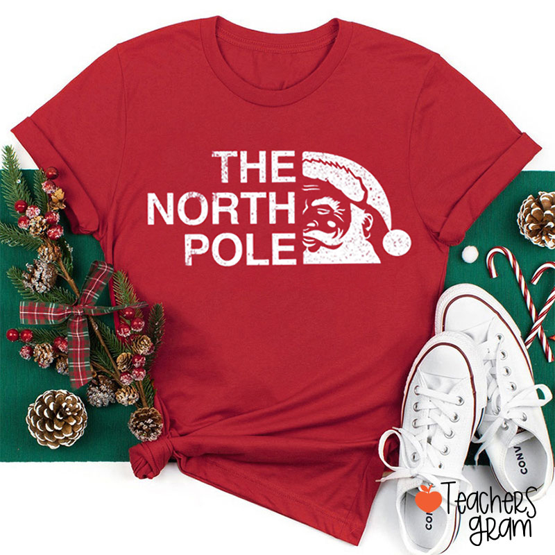 The North Pole Santa Claus Teacher T-Shirt
