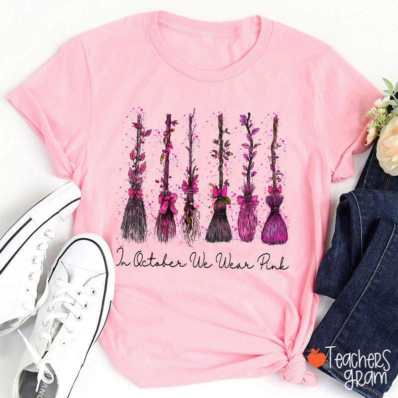 On Wednesday We Wear Pink Witch Broom Teacher T-Shirt
