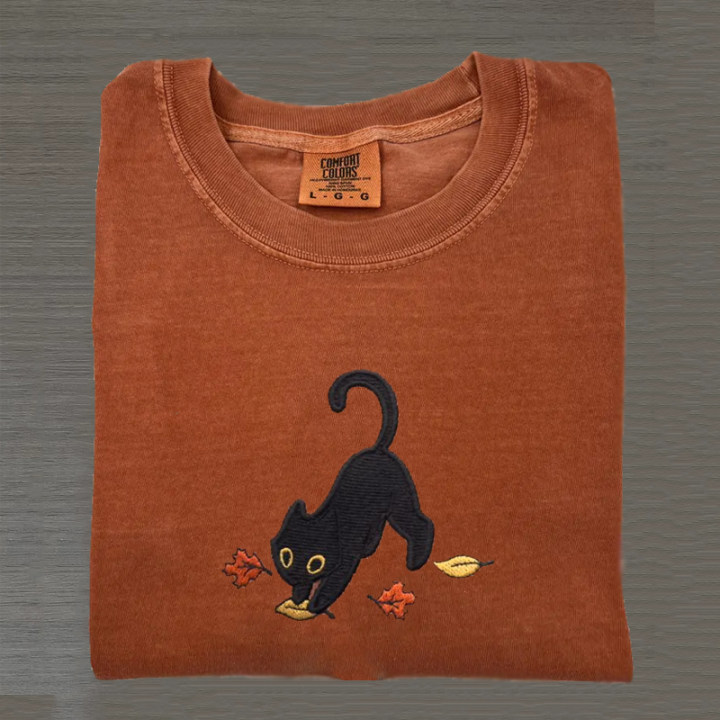 Cute Black Cat Pouncing Leaves Embroidered T-shirt