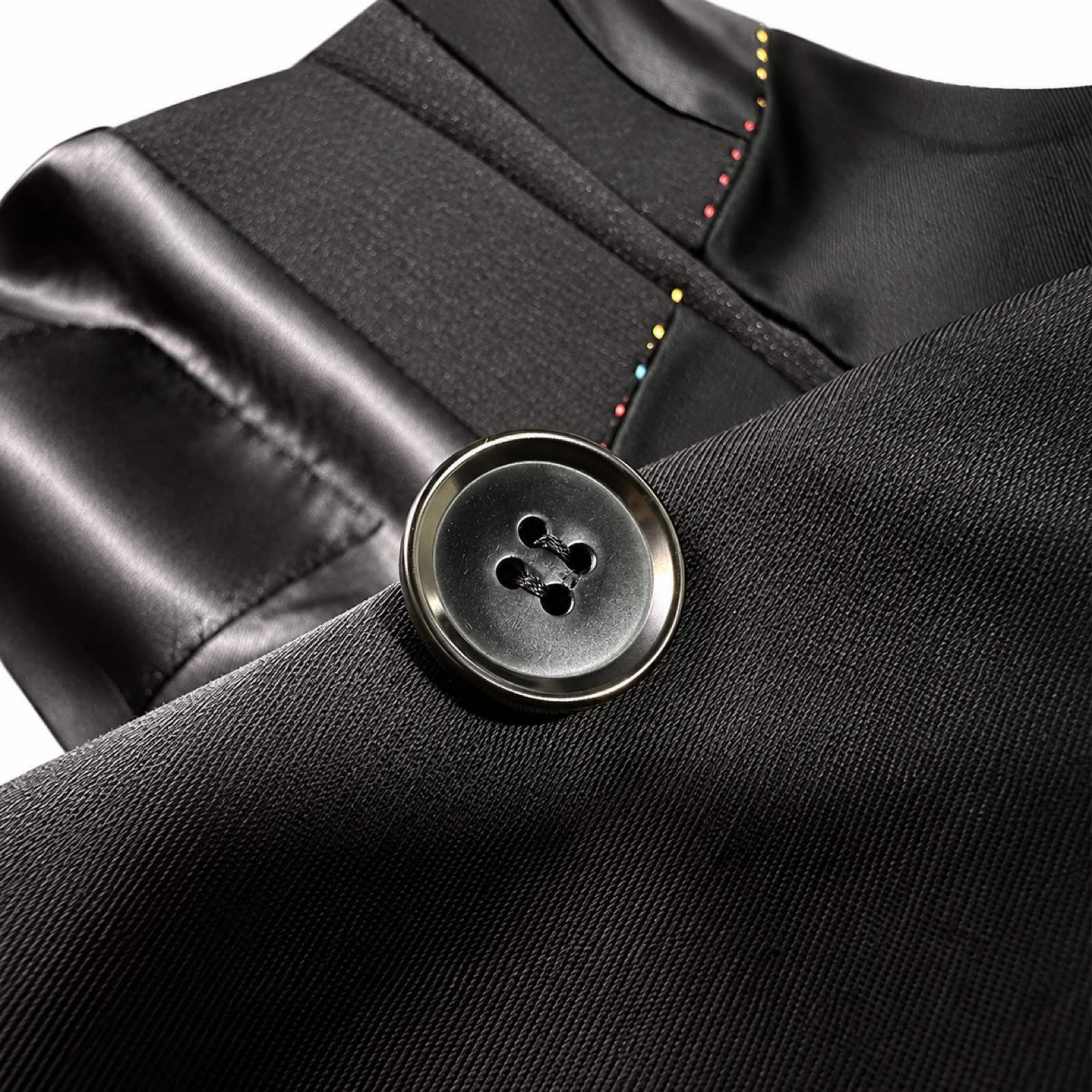 Men's black double-breasted blazer with gold studded shawl lapels and matching trousers