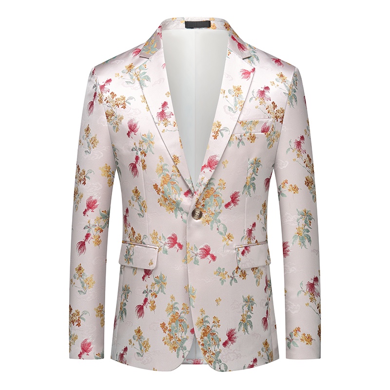 Close-up of a men's white jacquard suit jacket with red, yellow, and green floral patterns, showing the one-button closure