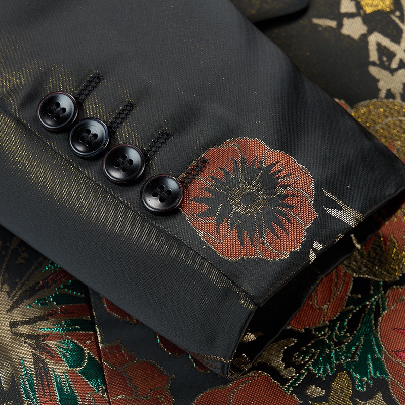 Front view of a dark grey men's blazer with vibrant floral and butterfly jacquard pattern, one-button closure.
